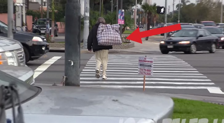 They give $100 to a homeless guy and then follow him: what happens next is amazing !
