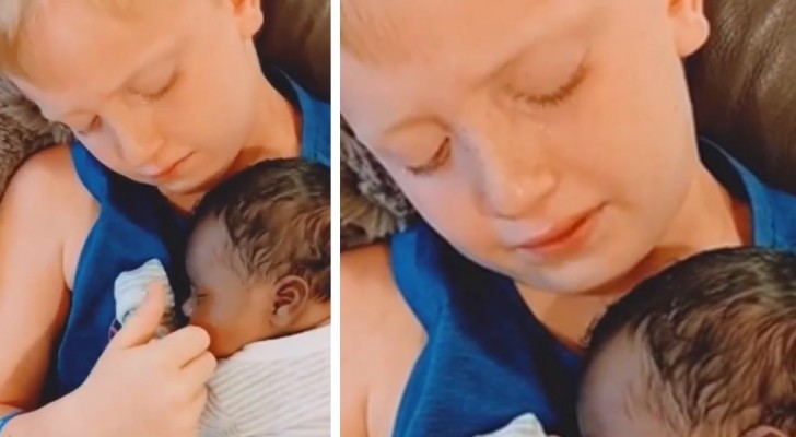 9-year-old boy holds his foster brother in his arms for the first time and can't hold back his tears