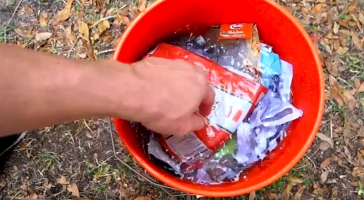 This man puts his junk MAIL in a bucket of water: the result is surprising.