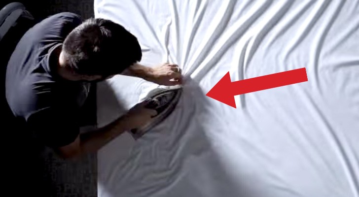 This artist will blow your mind, using just a sheet and an iron !