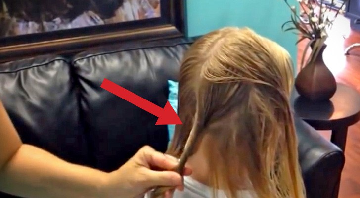 She starts twisting her hair...what she creates is crazy !!