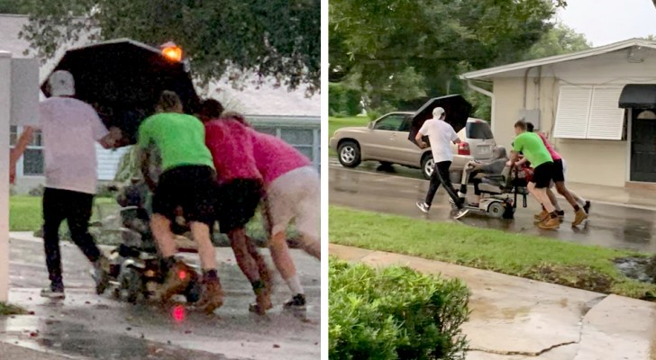 Quattro uomini spingono un'anziana sullo scooter per 1 km: si era bloccato mentre stava piovendo a dirotto
