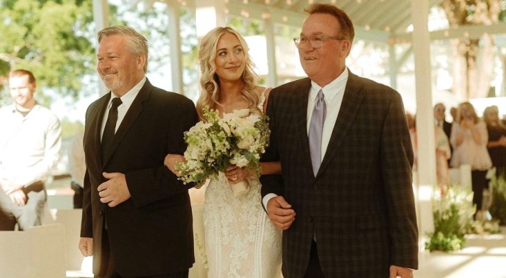 Her father accompanies his daughter to the altar but as she walks down the aisle she also invites her stepfather to join them