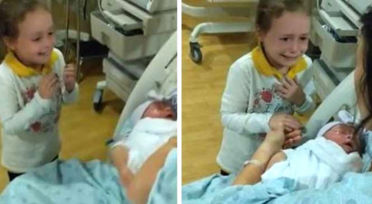 En flicka blir rörd när hon ser sin nyfödda lillasyster för första gången (+VIDEO)