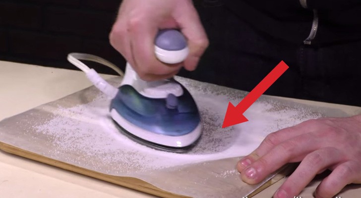 He moves the iron on wax paper for a minute... The result is brilliant!
