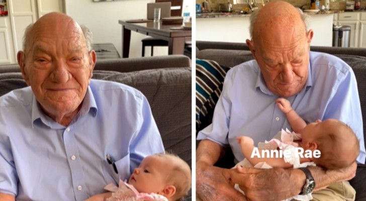 Han håller sitt barnbarn i famnen för första gången och blir rörd: 
