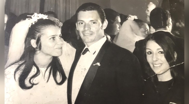 In an old wedding photo, the groom is shown arm-in-arm with his lover