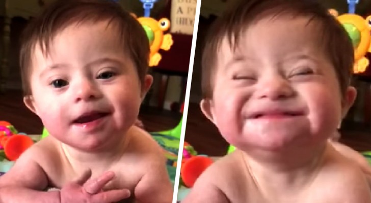 Pas geadopteerd meisje met het syndroom van Down lacht voor het eerst naar haar nieuwe moeder (+VIDEO)