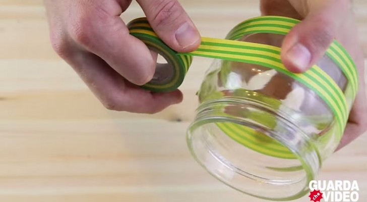 He start by putting some tape on a jar ... the end result will surprise you!