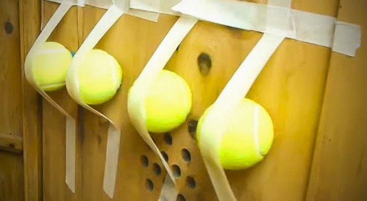 He attaches tennis balls in the shoes cabinet : How? This is BRILLIANT !