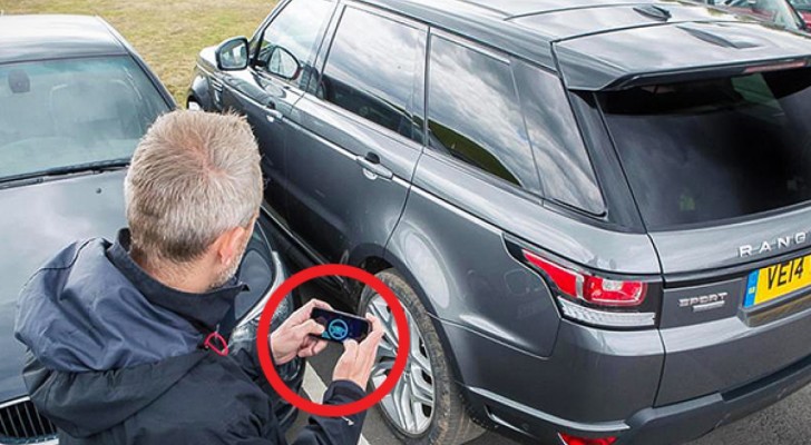 It looks like he's playing on is mobile ... but it will be hard to believe what his car does next !