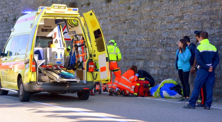 Two young men pretend to be sick to get a free lift in an ambulance