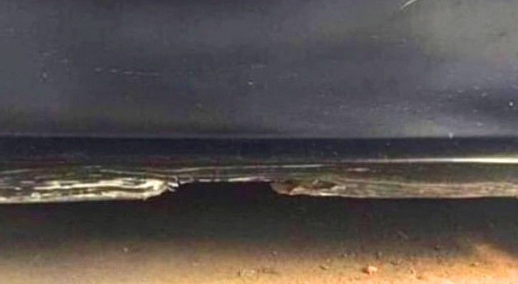 What do you see portrayed in this photo? If you think it's the sea at night, you need to take a closer look
