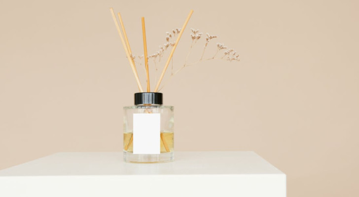 reed stick air freshener on a white table