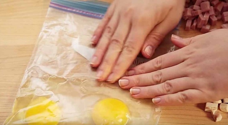 She puts eggs in a bag ... What she's about to create is delicious!
