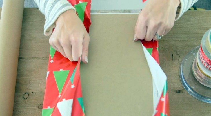 She's out of wrapping paper, but is still able to create a beautiful package thanks to a brilliant idea