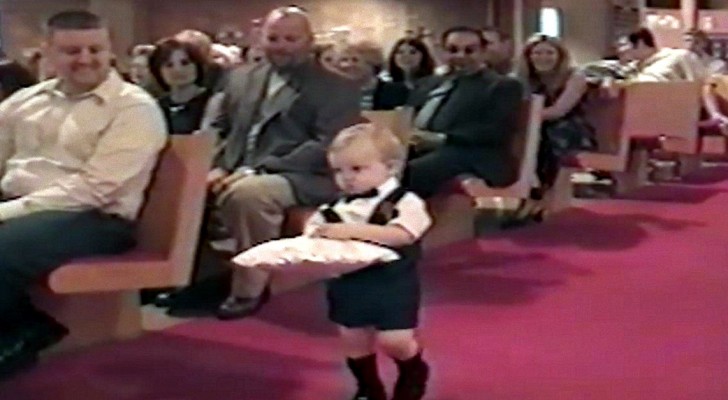 The little ring bearer is doing fine --- but see what he does at the end! 