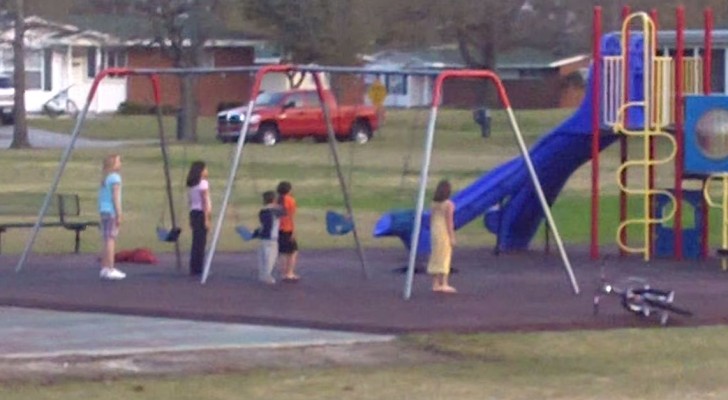 A mother sees her children stand immobile on a playground ---The reason makes her proud!