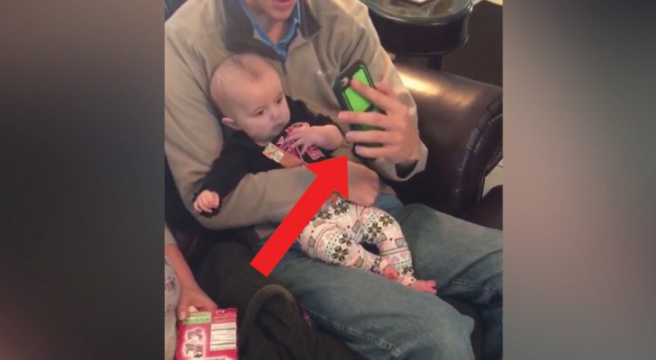 Dad turns the camera towards the baby --- His reaction is incredible!