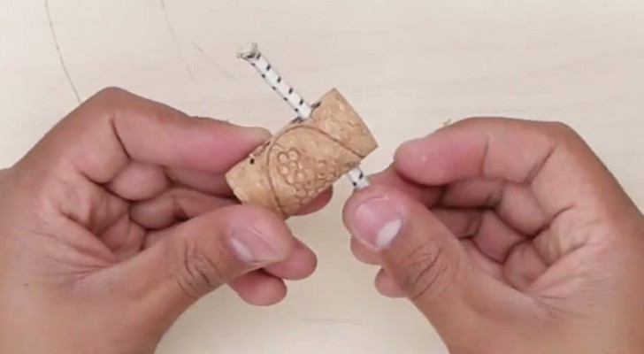 Pass a bungee cord through a wine cork?! --- Why? -- Discover this clever hack!
