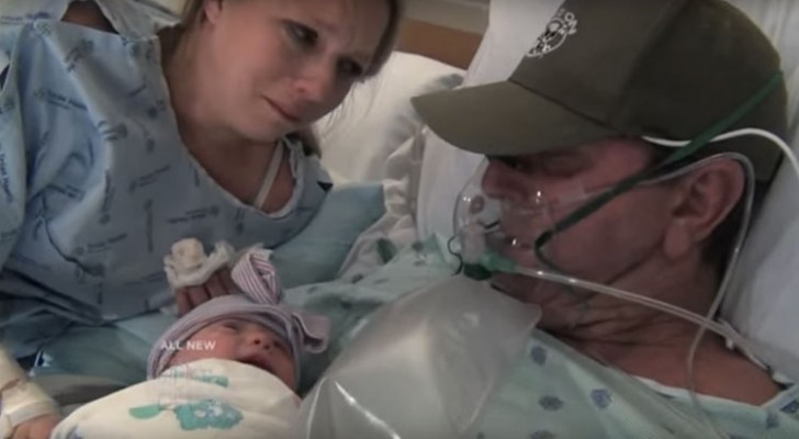 A dying man has just become a father --- his first hug is touching!