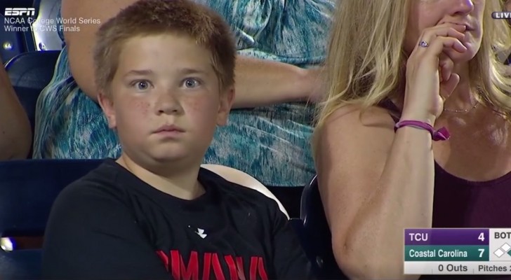 An ESPN TV camera cuts to him during a game --- His reaction? Wow! 