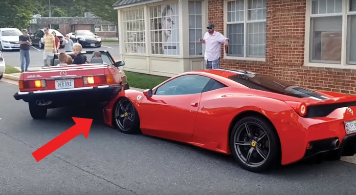 An unfortunate lady driver --- ends up on top of a $400,000 FERRARI